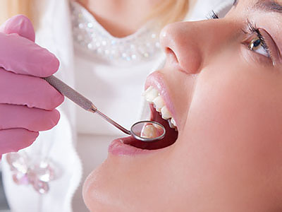 Kennedy Dentistry | Extractions, Fluoride Treatment and Sports Mouthguards